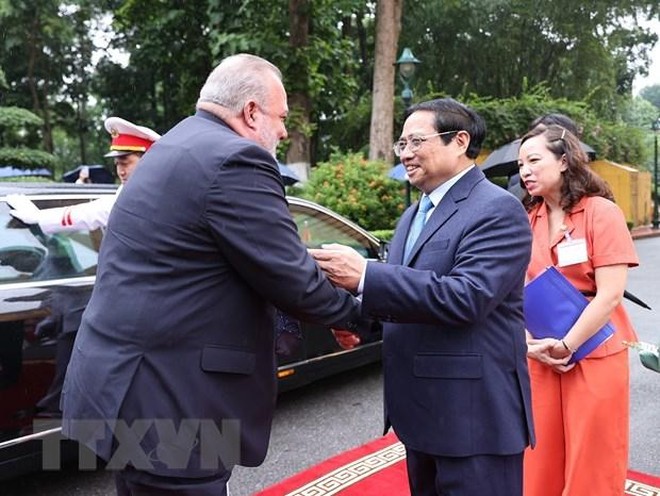 Thủ tướng Phạm Minh Chính chủ trì lễ đón Thủ tướng Cuba Manuel Marrero Cruz thăm hữu nghị chính thức Việt Nam ảnh 1